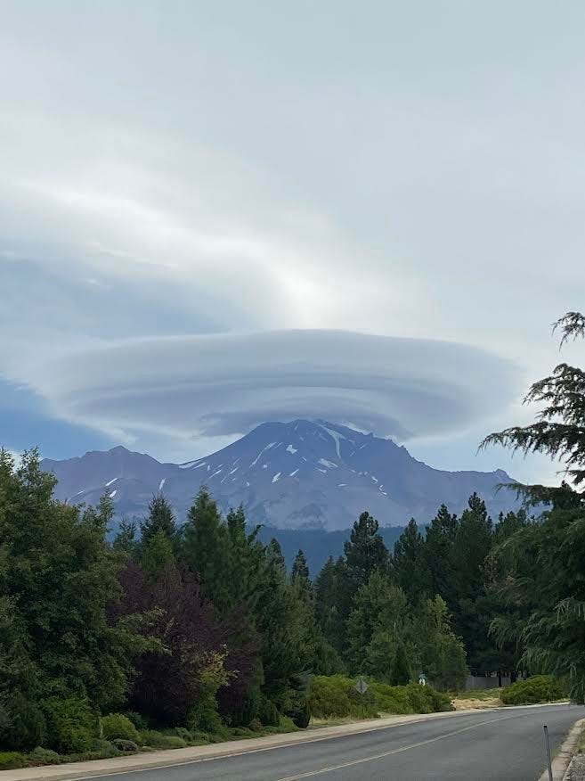 Mt. Shasta with a lenticular cloud hovering above.