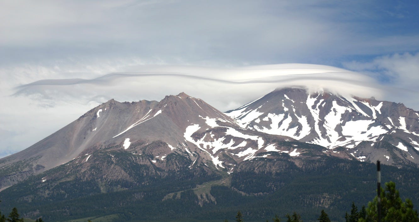 A thin layer of lenticular cloud over Mt. Shasta.