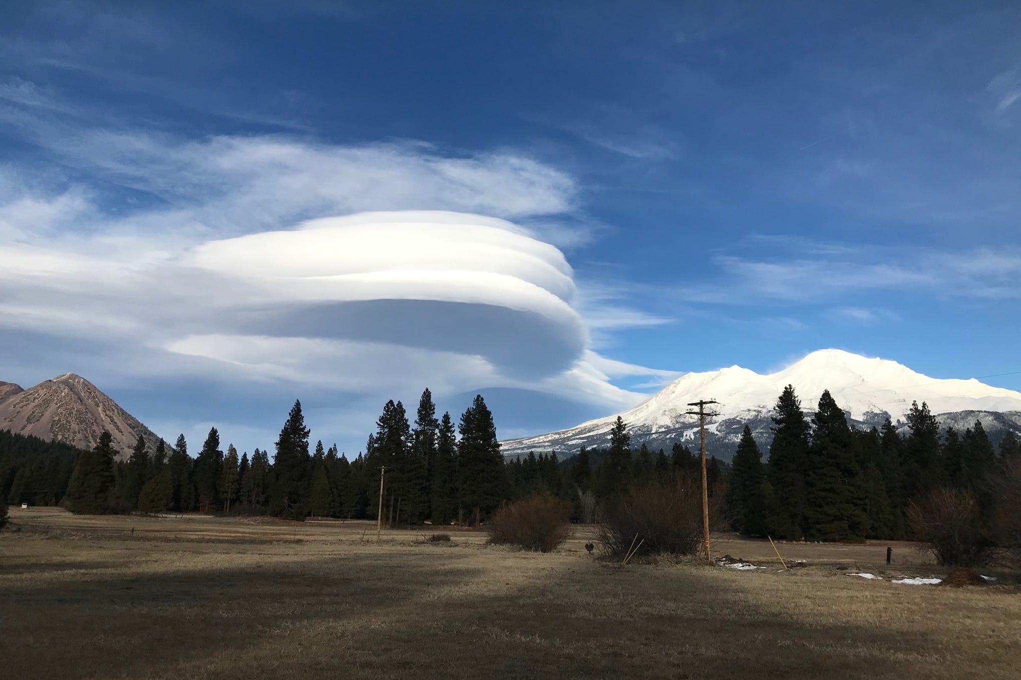 A lenticular cloud can be seen between Black Butte and Mt. Shasta.