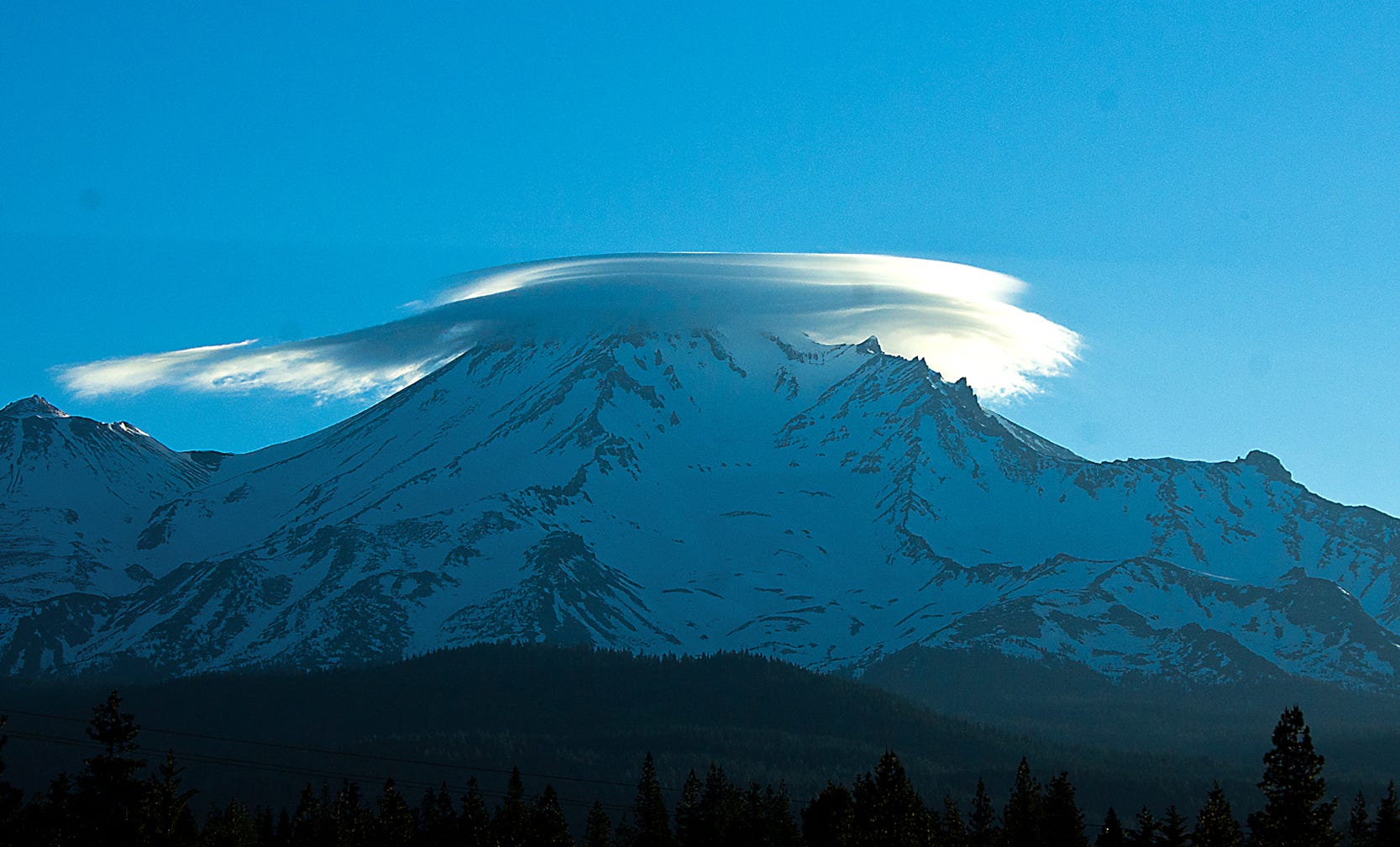 A lenticular cloud caps Mt. Shasta in June of 2012.