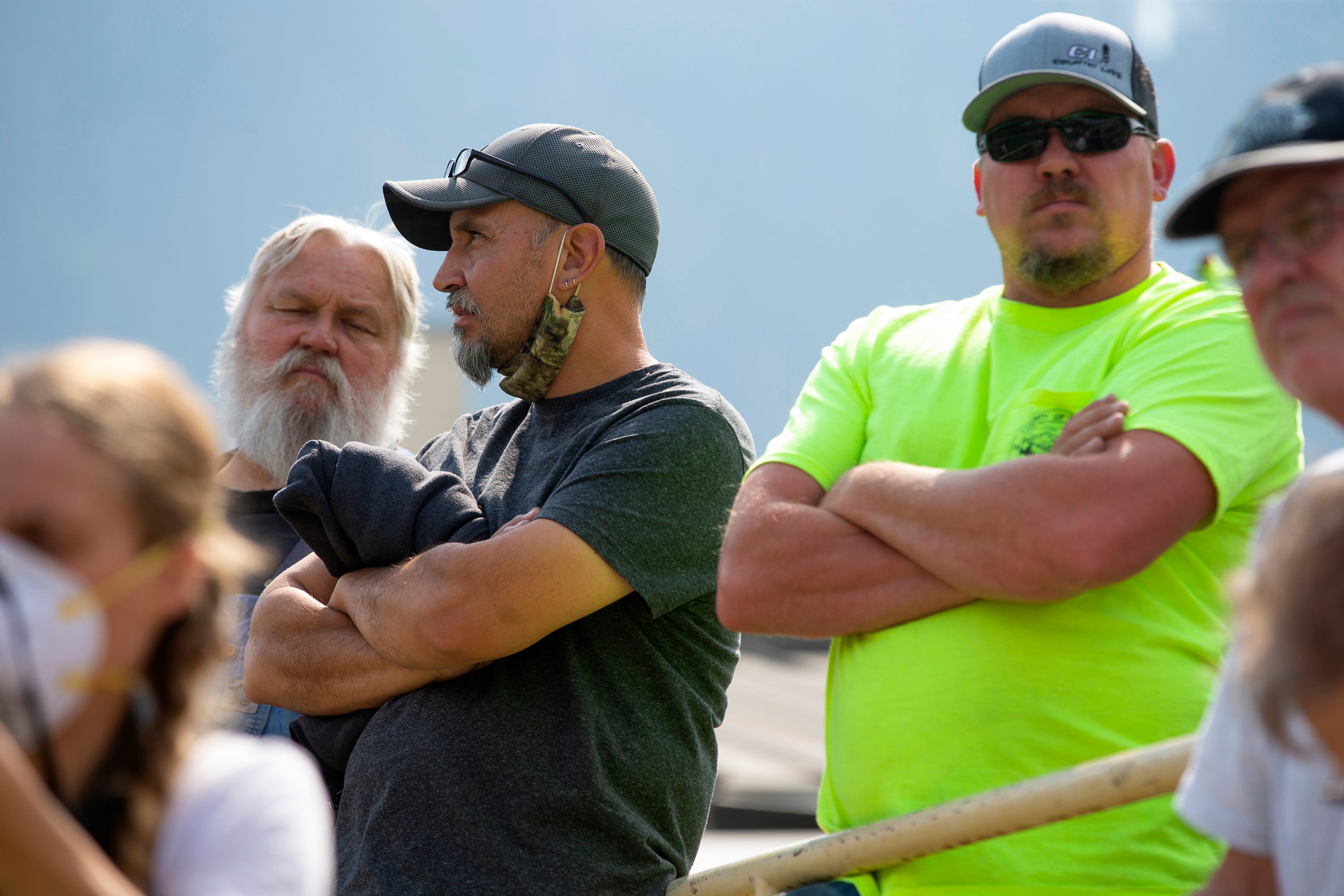 Leeon Hillman (center) and his wife, Erin, lost their Happy Camp home to the Slater Fire on Sept. 9, 2020. Leeon attends a community meeting on Sept. 23 at Happy Camp High School.